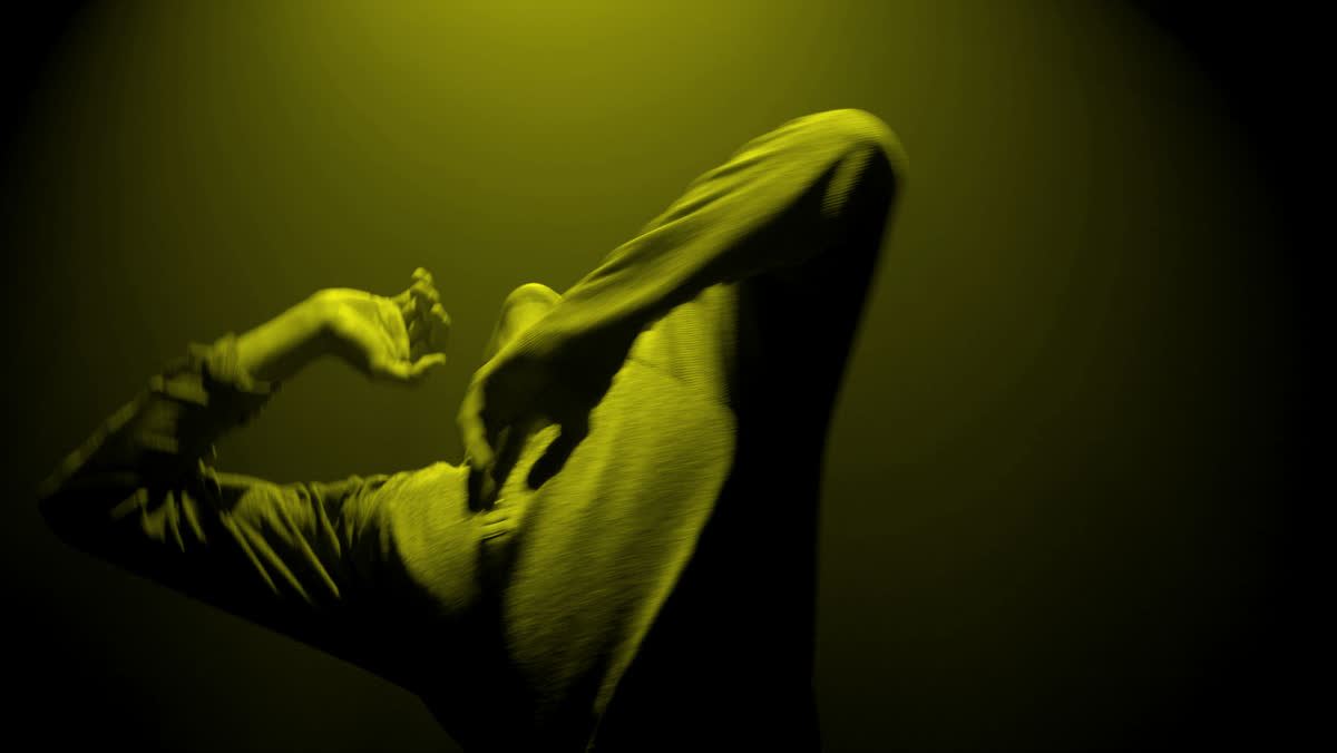 Dancer mid-move, yellow duotone