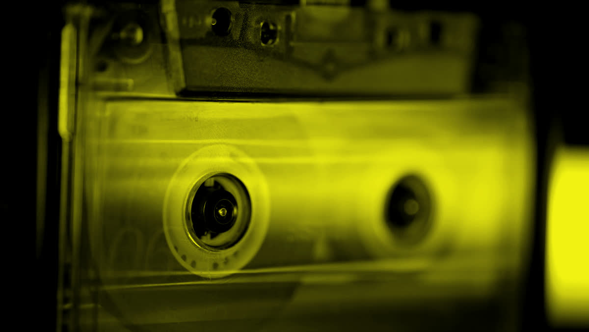 Cassette tape close-up, yellow duotone